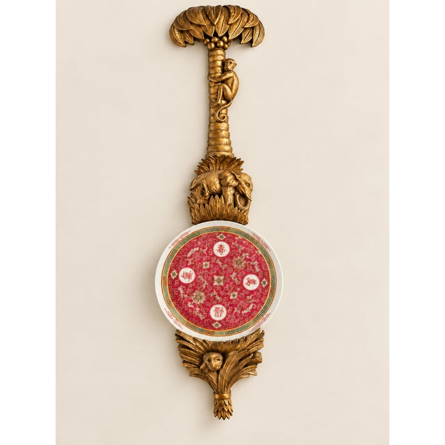 Offered is an extremely unusual vintage wall plate bracket. Its color appears as patinated brass. This piece features a...