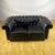 This 1960s chesterfield club sofa is a timeless icon of vintage british design. The allure of this modern piece lies in...