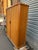 Beautiful oak and oak veneer cabinets. They open and close in the style of tambour door filing cabinets (roll-up...