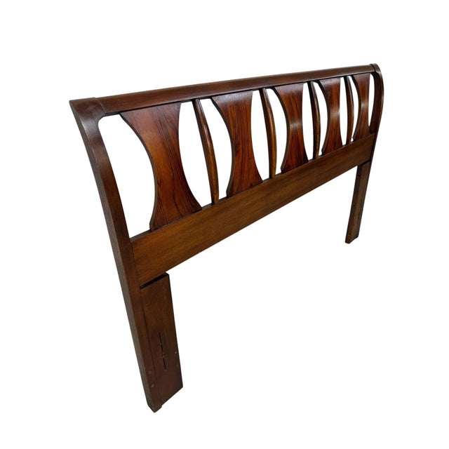 Elevate your bedroom with this iconic Mid-Century Modern Kent Coffey Perspecta walnut headboard, designed to fit both full...