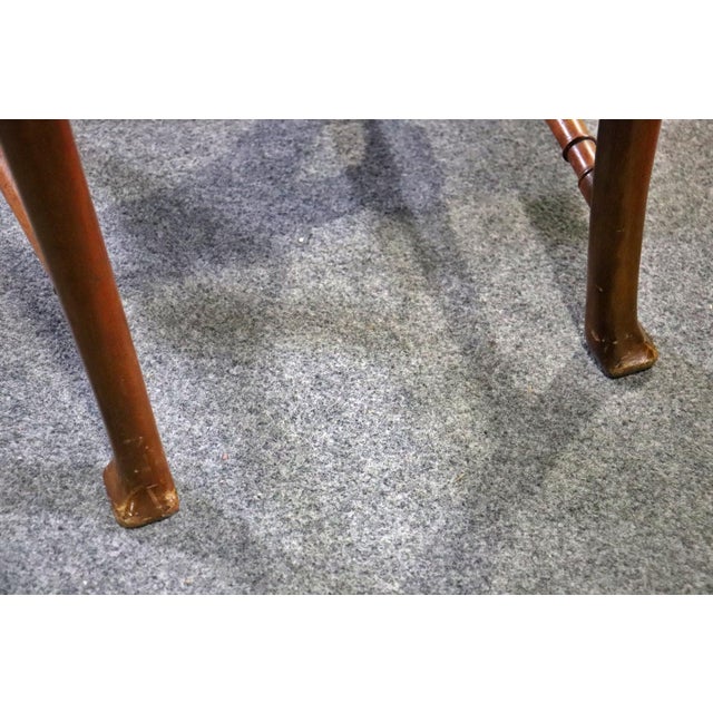 Matching dining table listed separately. From Slatoff Estate. Ball and claw feet. Shell carved knees. Mahogany. 8 side...