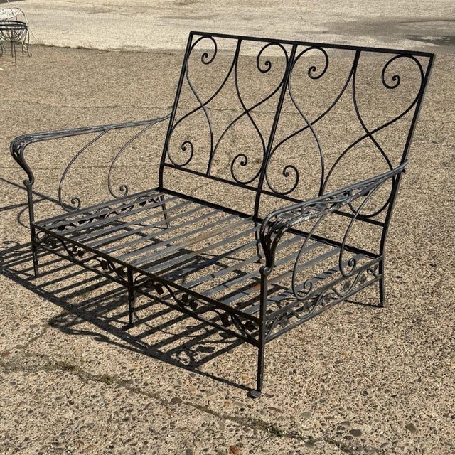 Vintage Salterini Style Wrought Iron Garden Patio Settee Loveseat by Florentine Craft Studio. Circa Mid 20th Century....