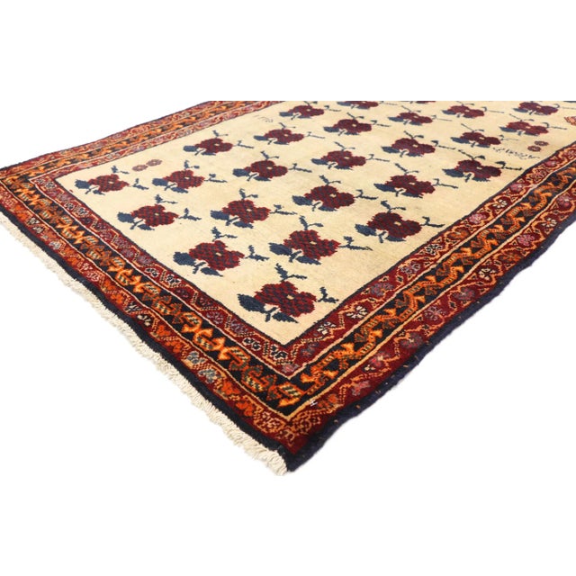 Vintage Persian Shiraz Accent Rug 03'04 X 05'07. This hand knotted wool vintage Persian Shiraz accent rug features an all-...