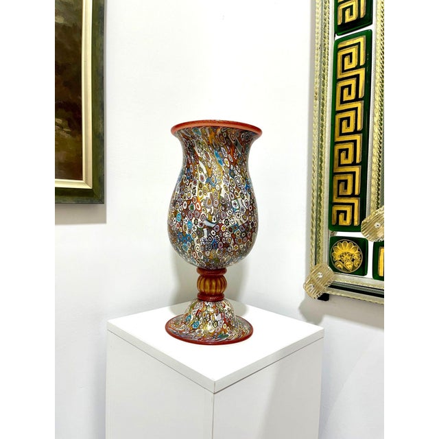 Price reduced $300. Now only $990! Lovely tall vase using the Murrine method of Murano Glass. Signed by the Artist.