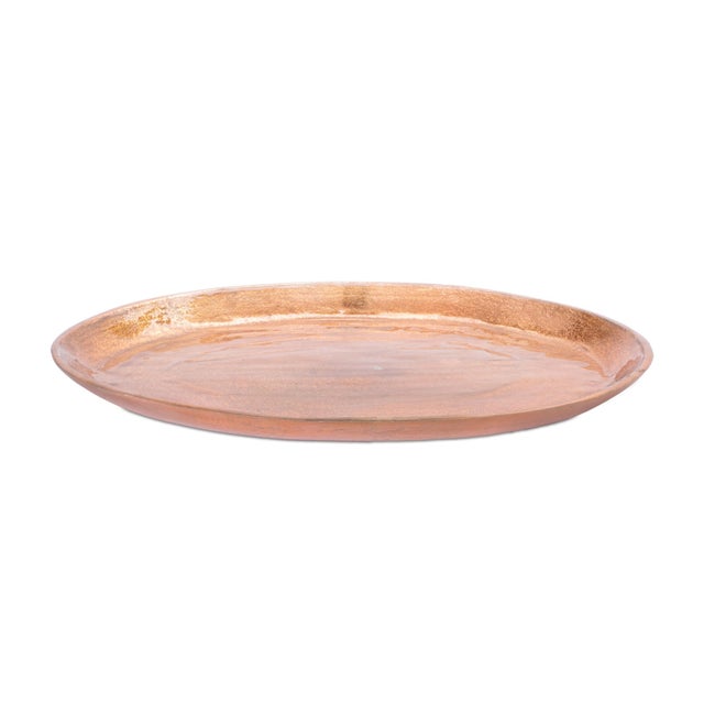 Elevate your decor with the Metallic Aluminum Tray. Featuring chic gold tones with brushed metallic touches and a glossy...