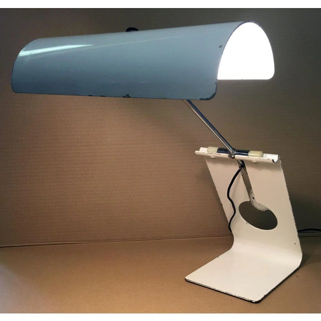 This original adjustable Picchio (Woodpecker) lamp was designed by Mauro Martini and produced by Fratelli Martini. I have...