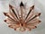 Elegant Italian flush mount with satin copper finish frame handcrafted to resemble a convex dahlia flower, designed by...