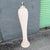 A striking vintage Postmodern floor lamp featuring a tall sculptural body with sweeping spiral fluting from top to bottom....