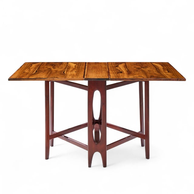 Bendt Winge Mid Century Norwegian Rosewood Drop-Leaf Rosewood Dining Table This table measures: 8.25 wide x 34.75 deep x...