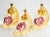 Three adorable large mouth blown-in-mould glass ornaments depicting an angel asleep on a crescent moon, hand decorated in...