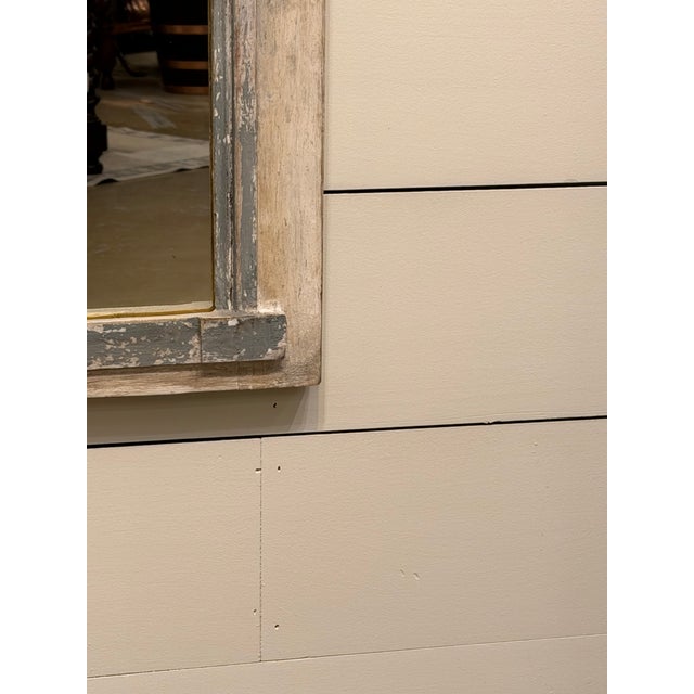 This is a matching pair of antique French Trumeau mirrors."Trumeau" means the wall space between windows in French...