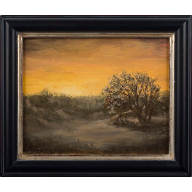 The painting depicts a serene winter landscape at twilight, where subtle hues of orange and gold blend seamlessly into the...