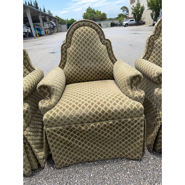 4 Dining Chairs Upholstered in velvet Nancy Corzine Fabric. The armchair features a high, arched scalloped back, rolled...
