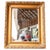 foliate ornamentation. The frame displays a refined balance of high-relief detailing at the corners with a delicately...