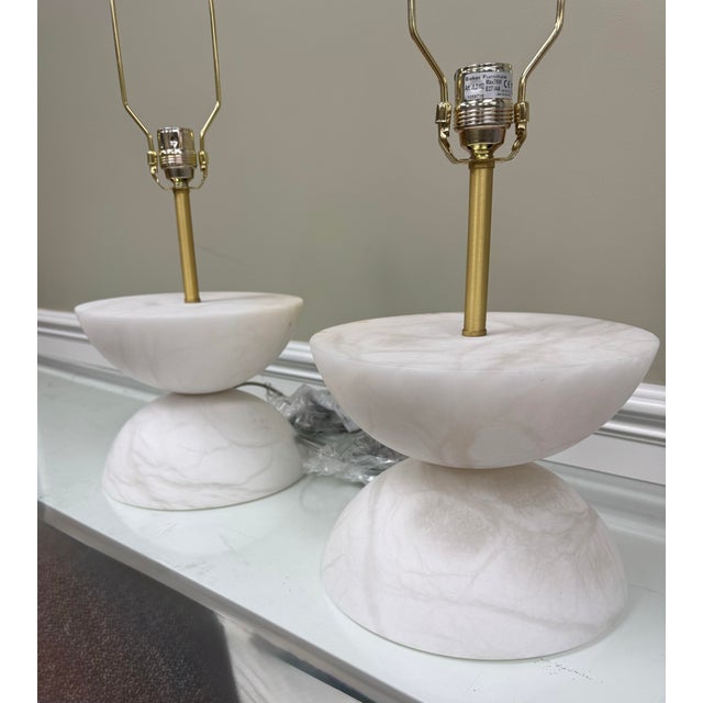Baker "Obsidian" Table Lamp designed by Jean-Louis Deniot. This stunning French Modern lamp has an alabaster base with...