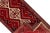 Beautiful vintage Persian Shiraz hand-knotted wool runner with a red field. This rug has a multi-color accent in an all-...