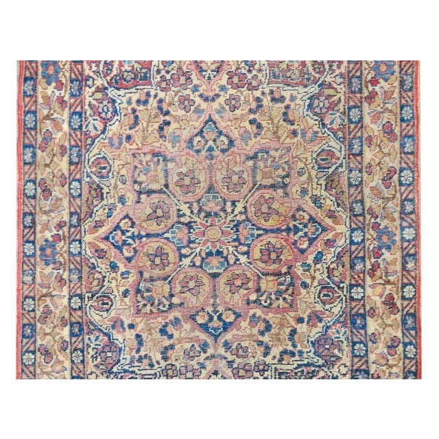 A wonderful early 20th century Persian Lavar Kirman rug with a traditional pattern containing a central eight-lobed...