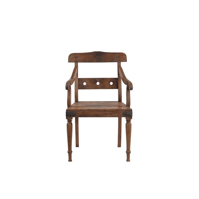 This Vintage Anglo-Indian Teakwood Armchair is handcrafted from solid teakwood, showcasing elegantly scrolled arms, turned...
