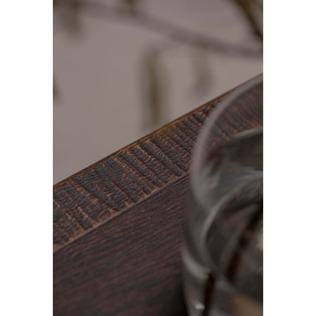 A rare and exceptional French Brutalist sideboard, crafted in solid dark stained oak and defined by its strong...