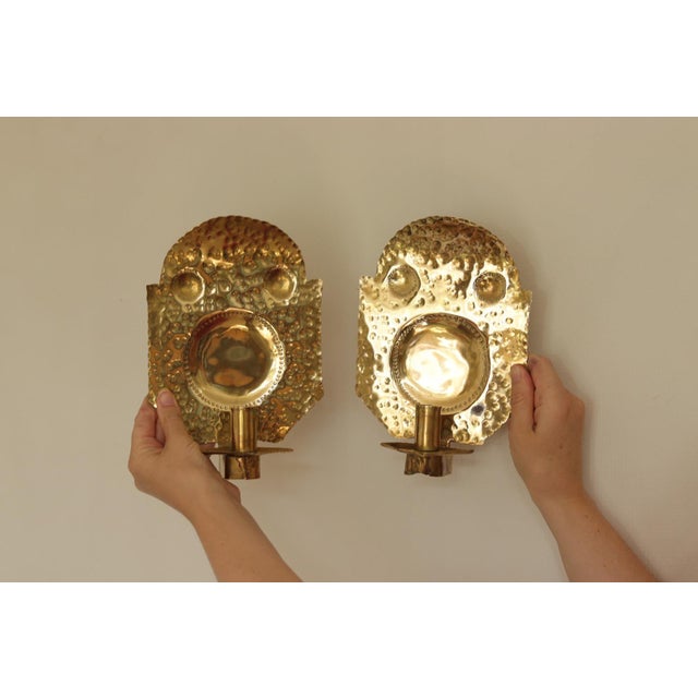 Stunning pair of Swedish brass sconces, featuring beautiful detailing. Both sconces are in very good vintage condition...