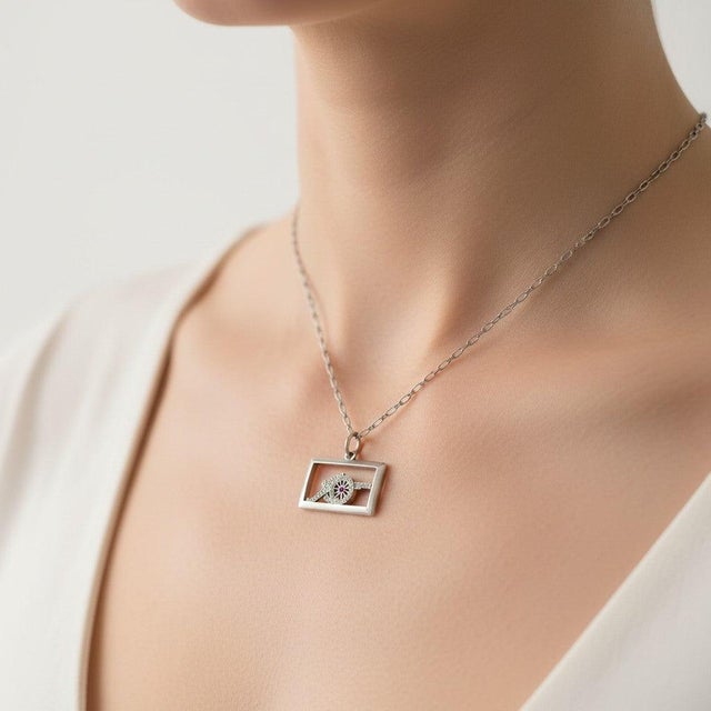 A rare and captivating piece of history, this authentic Art Deco rectangular pendant / charm (circa 1920) is a spectacular...