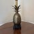Beautiful large brass pineapple lamp on wooden base. Minor wear and patina consistent with age. In working condition with...