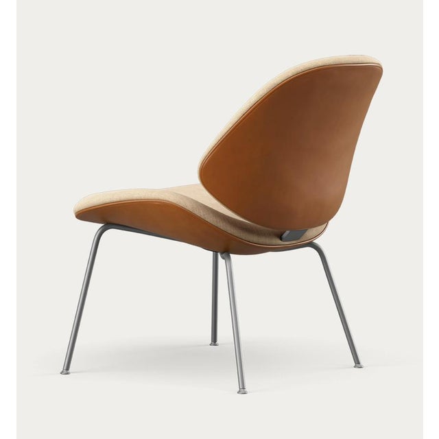 Salto and sigsgaard council family lounge chair legs: chrome, duo upholstery:front: remix 242 + back: nevada cognac for...