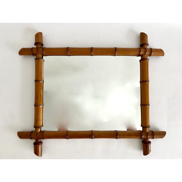 This English faux bamboo mirror has a very well preserved finish with lovely sheen and likely a newer mirror. Mirror...
