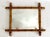 This English faux bamboo mirror has a very well preserved finish with lovely sheen and likely a newer mirror. Mirror...