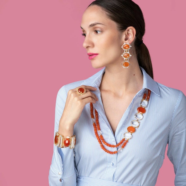 The Ann-Margaret Statement Earrings are designed for versatility with an interchangeable design, allowing you to create...