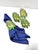 Set of four vintage cloisonné napkin rings shaped like lush green Christmas or pear trees, richly decorated with hand-...