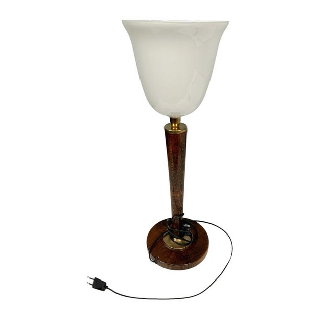 This elegant Art Deco table lamp dates to the 1920s–30s and features a beautifully figured walnut column rising from a...