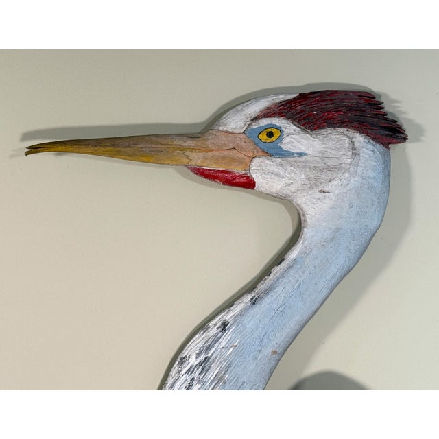This massive hand carved wooden folk art heron sculpture appears to date to the mid 20th century and was likely made as...