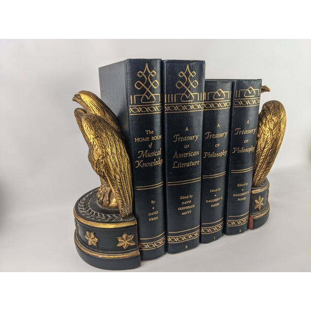 Striking coordinated set of four vintage blue volumes with decorative gold gilt lettering and ornamentation, published in...
