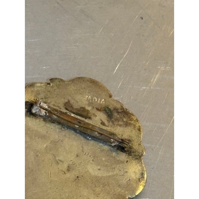 1940s-50s silvertone/multi cabochon cluster brooch. Marked "India" at back. Some mild patina to metal throughout as shown.