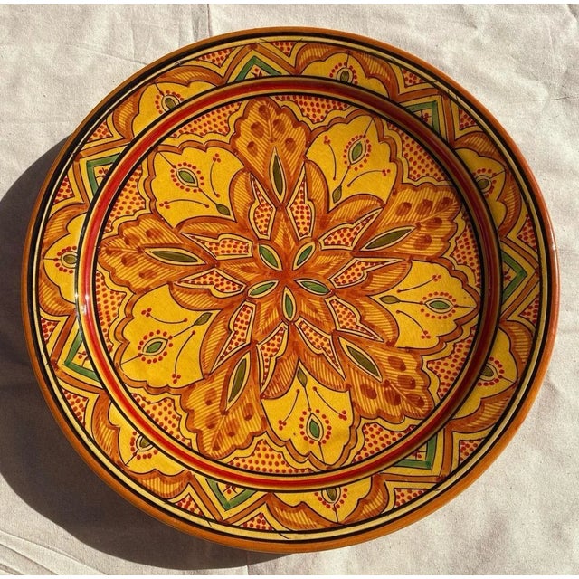 A Moroccan porcelain dish handmade in the Moroccan city of ESFI, famous for its clay and porcelain craftsmanship These...