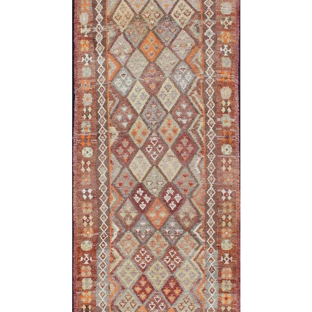 Vintage Turkish runner, from Kurdish part of Turkey with geometric diamond design in red, maroon, orange, and gray, rug...