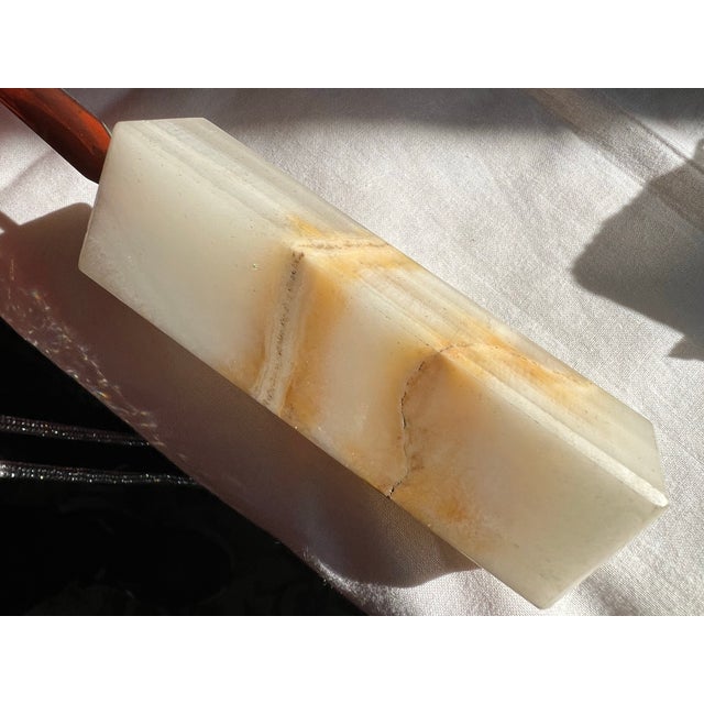 Up for consideration is a beautiful vintage letter opener with a marble handle. This would look lovely in your home and it...