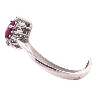 14 Karat White Gold and Ruby Ring Surrounded by Diamonds For Sale