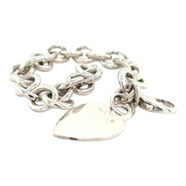 1990s Tiffany & Co Estate Heart Charm Bracelet Sterling Silver For Sale