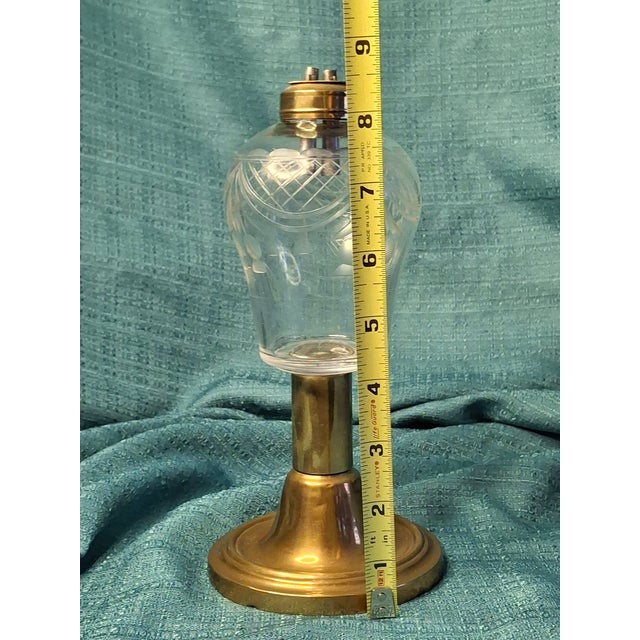 This is a superior example of early 19th-century American lighting, distinguished by its high-quality decorative finish...