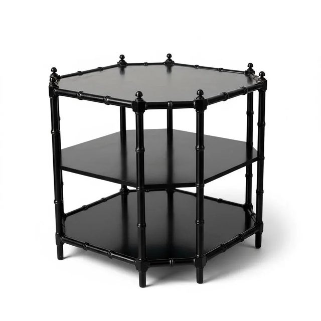 This is a pair of Regency style faux bamboo tiered side tables attributed to Baker Furniture. These have timeless appeal...