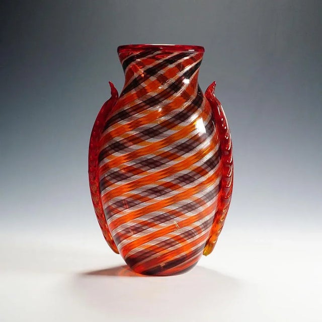A large Murano art glass vase, designed and made by Eugenio Ferro & C. 1929 srl in 2009. Thick clear glass with spiral...