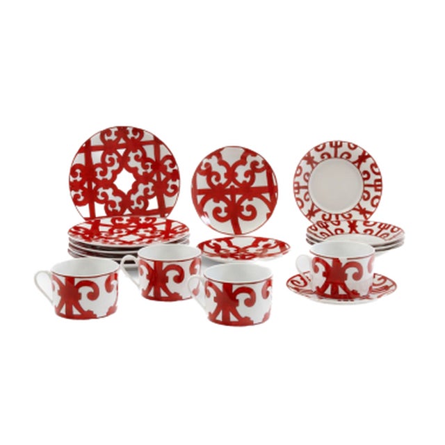 HERMÈS Paris, made in France – “Balcon du Guadalquivir” porcelain dinnerware set, decorated in red and white monochrome....