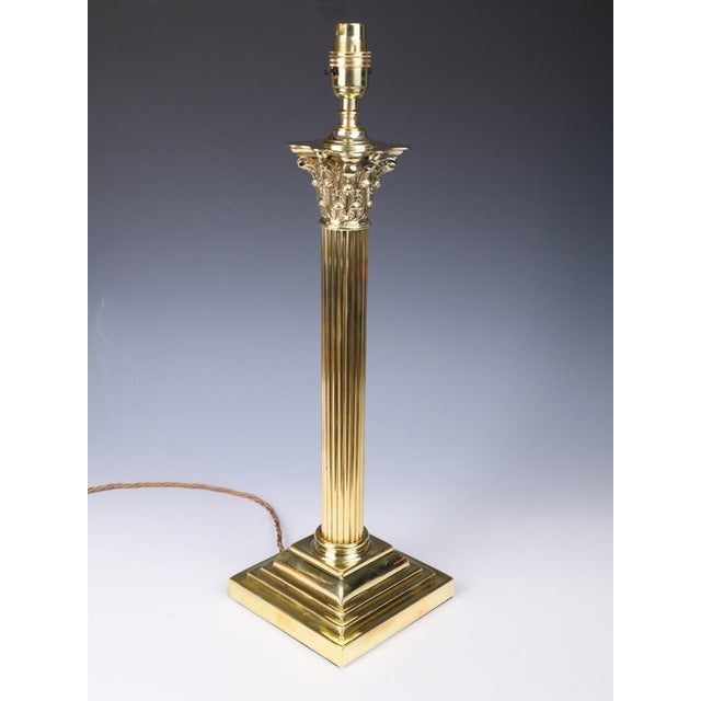 Antique english brass corinthian column table lamp an elegant antique english solid brass corinthian column table lamp of...