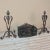 19th Century Wrought Iron Andiron & Firebox Set is a master work of the blacksmith's art, forged from red-hot iron to last...
