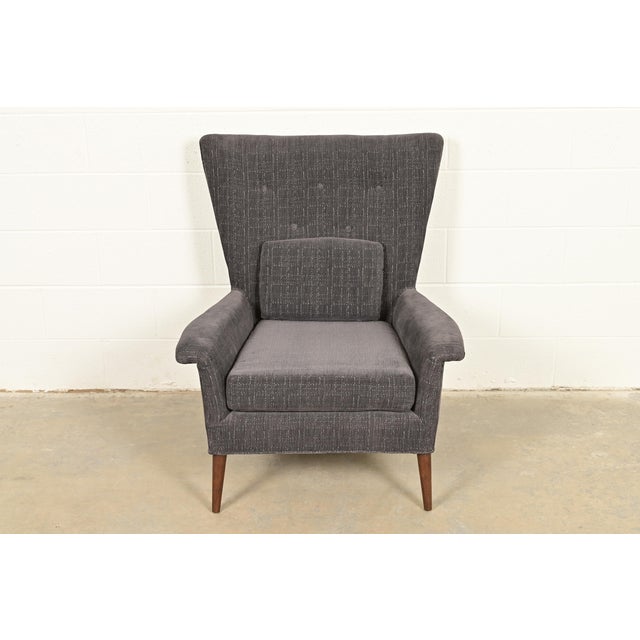 An outstanding Mid-Century Modern wingback lounge chair By Paul McCobb for Custom Craft Furniture, "Planner Group" USA,...