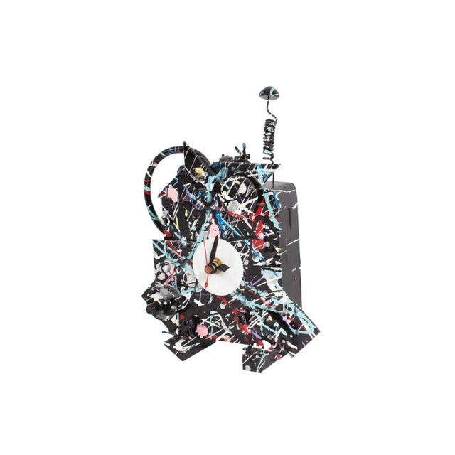 A 1990 "Fantasy" Postmodern clock by the American artist Richard Birkett. Made from a variety of found objects, the clock...