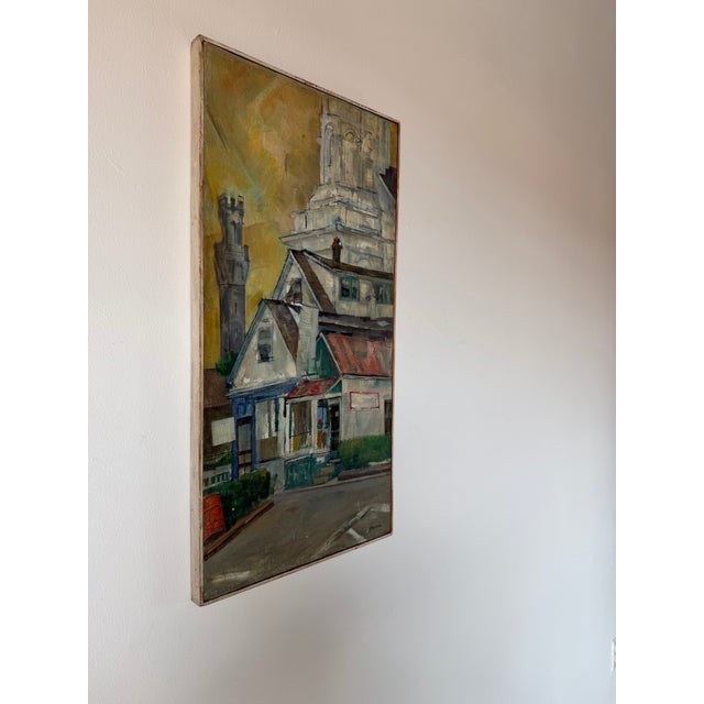 A beautifully executed 1970s vintage Impressionist cityscape oil on canvas depicting a charming streetscape with quaint...