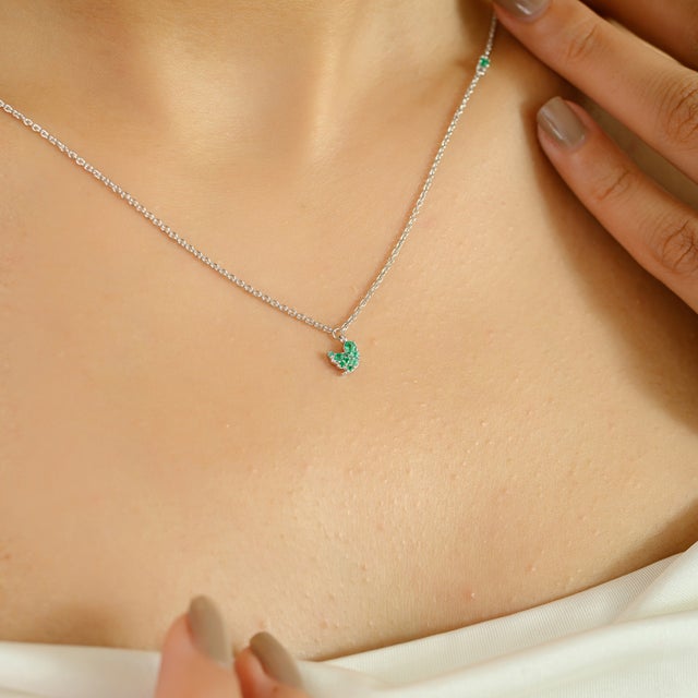 Delicate and enchanting, this celestial-inspired necklace is crafted in 14k white gold and features a graceful crescent...